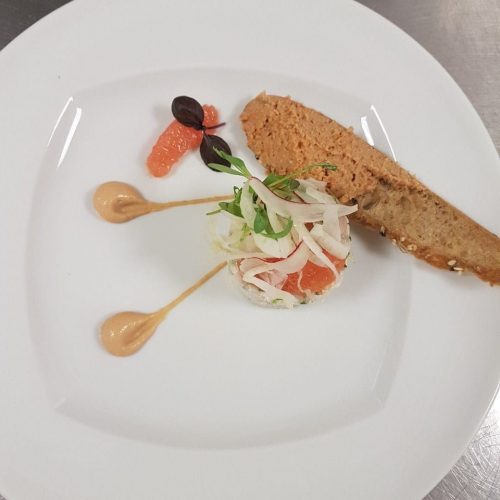 plated food on metal table